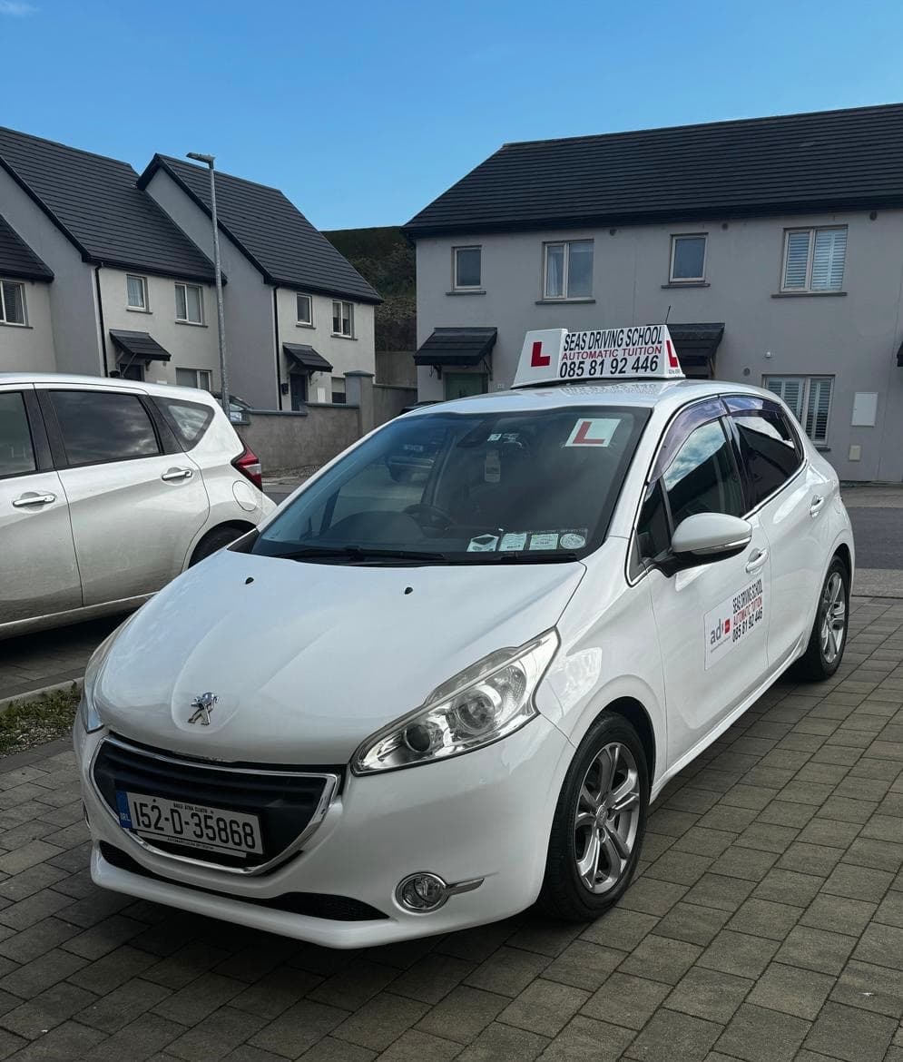 Seas Driving School car - side angle